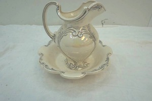 lot 55 image: iridescent glass bowl and water pitcher