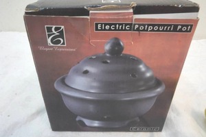 lot 69 image: electric potpourri pot and banana cologne decanter