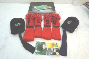 lot 99 image: golf club covers, golf ball pick-up, executive golf game court