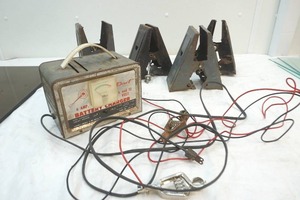 lot 218 image: saw horse brackets and Dart battery charger