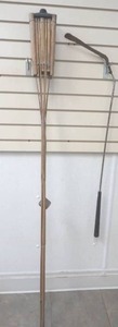 lot 290 image: tiki torch and weed whip