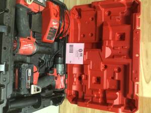 Milwaukee M18 FUEL 18-Volt Lithium-Ion Brushless Cordless Hammer Drill and Impact Driver Combo Kit (2-Tool) used customer returns see pictures