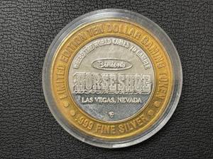 lot 28 image: Binions Horseshoe Ten Dollar Gaming Token .999 Silver
