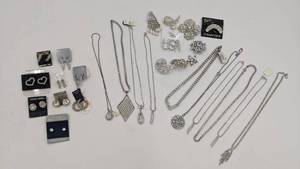 lot 38 image: Huge Lot of 1970s-1980s Vintage Deadstock Jewelry-Silver-Plated and Rhinestone Earrings, Brooches, and Necklaces