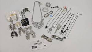 lot 40 image: Elegant Collection of 1970s-1980s Vintage Deadstock Jewelry-Black and Clear Crystal Earrings, Brooches, and Necklaces