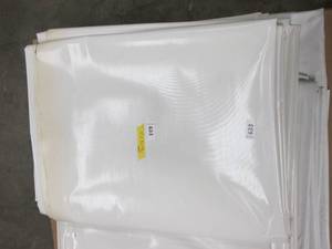 lot 633 image: NEW Vinyl Tarp - 10 x 30  White  White Vinyl Tarp - 20 oz. Heavy Duty