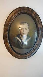 lot 7 image: Antique convex oval framed sailor