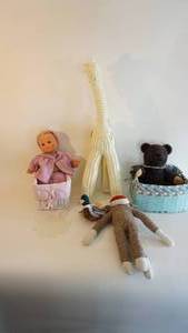 lot 22 image: Baby room stuffed toys, soft face doll and two baskets