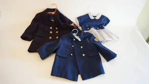 lot 25 image: Assorted nautical boys and girls clothing