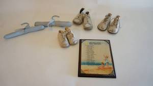 lot 33 image: Children learn what they live plaque and baby shoeshangers