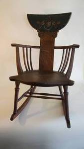 lot 35 image: RAREAntique Wooden Victorian Rocker Rocking Chair with headrest of carved DragonsSerpentsgreat condition with bowl-style armrests.
