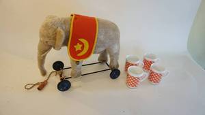 lot 55 image: AWESOME Antique pull toy14 inch Steiff Ridingpull toy circus elephant looks to be original with original Steiff tag