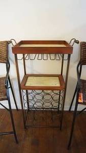 lot 70 image: Rod iron and wood wine rack shelf with hanging glass rack