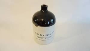 lot 100 image: Wow R.H. Macy & Co. New York  net contents one gallon  11 inch finger jug