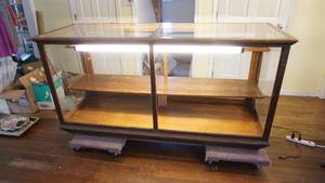 lot 1 image: Solid Oak Antique floor display showcase cabinet with original glass