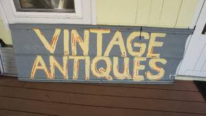 lot 299 image: Large hand-painted vintage antiques sign