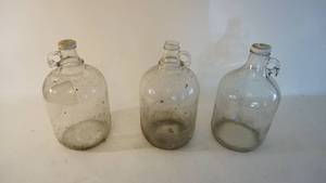 lot 323 image: Vintage glass finger jugs set of three