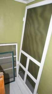 lot 359 image: 35 14 x 80 tall screen door, three pane window with glass, framed window with screen, to paint window with screen