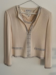 lot 110 image: Two Piece St. John Knit Sweater Ensemble