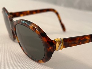 lot 98 image: Pair of Tortoise Shell Cartier Sunglasses