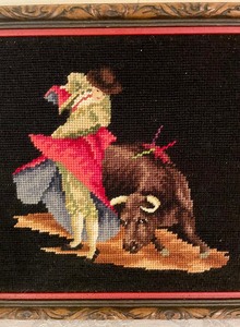 lot 149 image: Vintage Needlework featuring a Bull Fighter