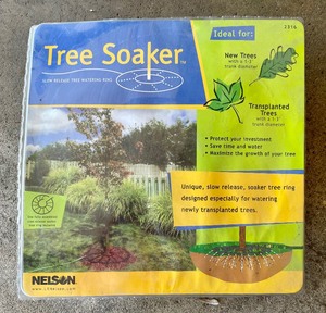 lot 209 image: New Garden Hose and Tree Soaker Ring