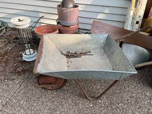 Wheel Barrel, Wind chime & Pots