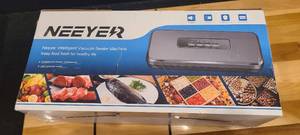 lot 102 image: Neeyer Vacuum Sealing Machine