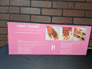 lot 124 image: hand trainer