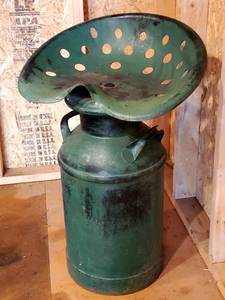 lot 2 image: Vintage Milk Can  Tractor Seat Combo