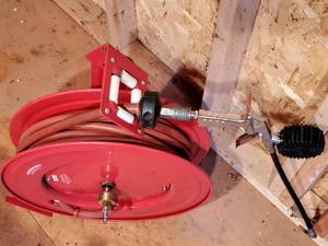 lot 10 image: Wall Mounted Air Hose Reel Unit