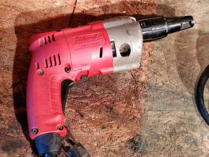 lot 40A image: Milwaukee Electric Drywall Screw Gun with an Extra Long Extension Cord