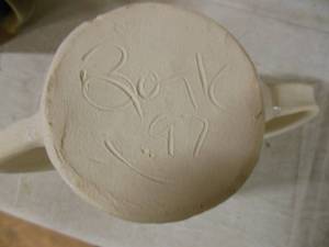 lot 32 image: His and Her Coffee Cups, Beer Bottle, Vases and Genuine Bork 97 Pottery