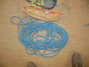 lot 16 image: Two Flats of Rope and Power Cords
