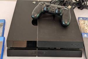 lot 90 image: PlayStation 4 Console and Games