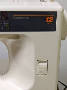 lot 101 image: Kenmore Sewing Machine and Supplies
