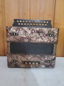 lot 28 image: Old Hohner Squeeze Box