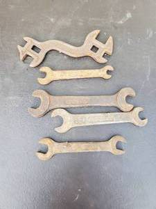 lot 98 image: Five Old International Harvester Wrenches