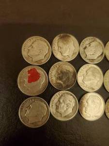 lot 15 image: Collection Of 12 Silver Dimes