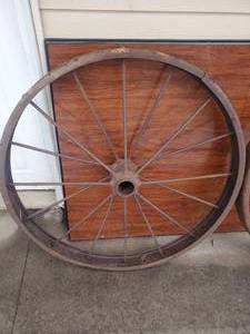 lot 27 image: Pair Of Antique Wagon Wheels