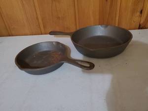 lot 104 image: Two Cast Iron Skillets