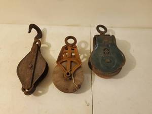 lot 146 image: Three Vintage Pulleys