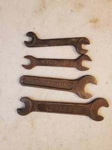 lot 151 image: Four Old International Harvester Wrenches