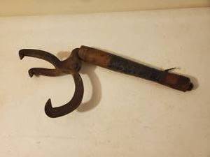 lot 179 image: Old Hand Held Log Grabber