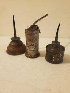 lot 194 image: Three Old Oil Cans