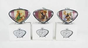 lot 53 image: Set of 3 Vintage Gil Elvgren Pin Up Alarm Clocks