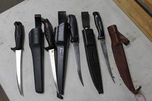 Lot of (4) Assorted Filet Knives with Leather Sheaths