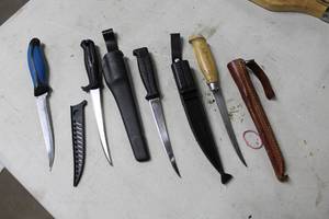 Lot of (4) Assorted Filet Knives with Leather Sheaths