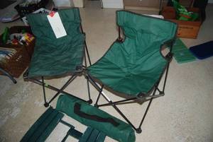 2 folding camp chairs and a f...