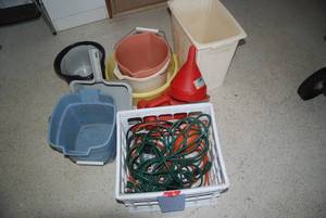 Lot of plastic pails extension cord...